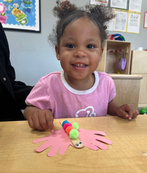 Child with Butterfly Craft at Pathways 2 Learning